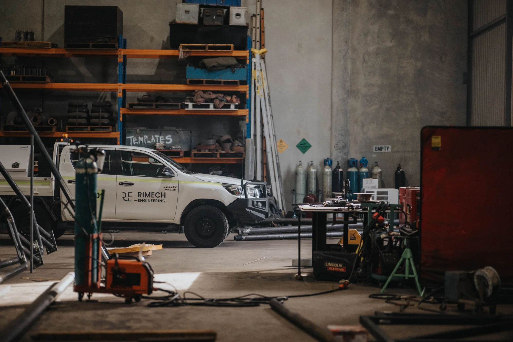 Rimech team working in the Henderson fabrication workshop.